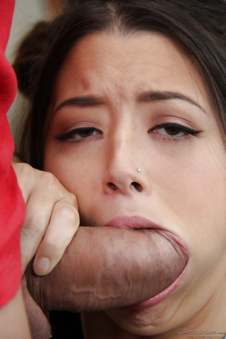 Lovely asian teen Daisy Haze sucking on an unbelievably massive meat