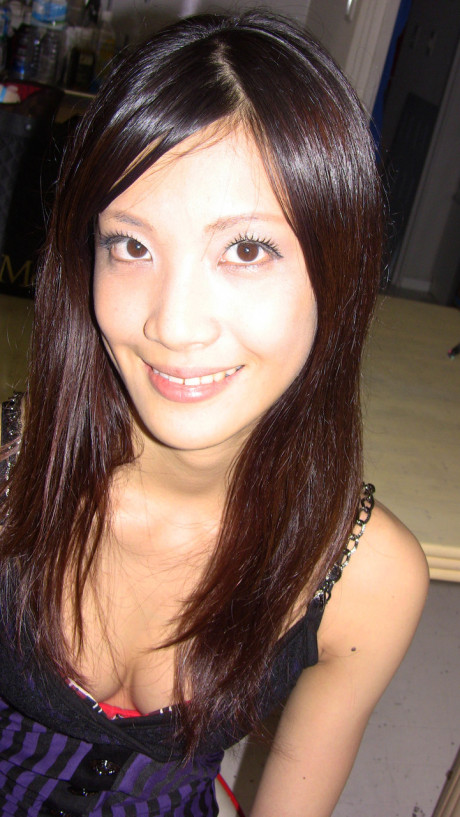 Brunette oriental amateur Haruka Ohtsuka unveils her slim figure and tight pussy