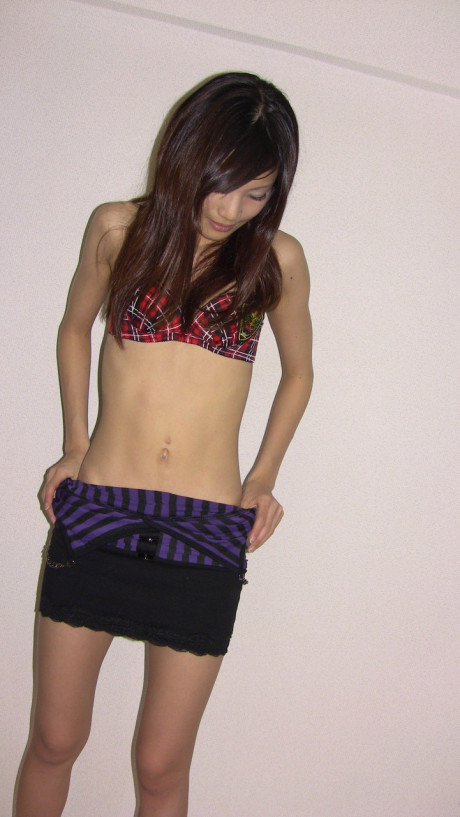 Brunette oriental amateur Haruka Ohtsuka unveils her slim figure and tight pussy