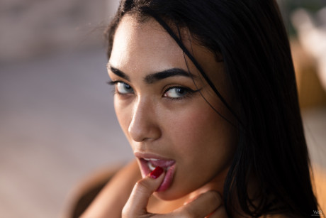 Raven-haired hispanic Karen Cardona squeezes her incredible humongous melons & poses