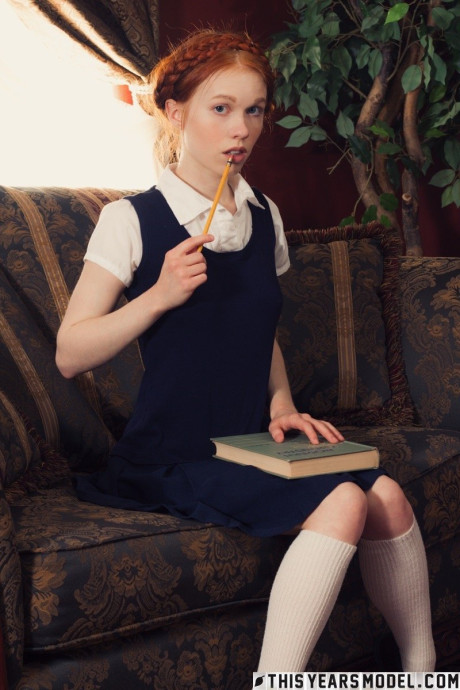 Young teen looking red hair Dolly Little gets undressed in white socks and Mary Jane's