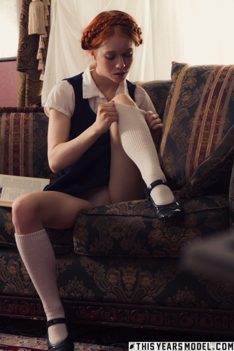 Young teen looking red hair Dolly Little gets undressed in white socks and Mary Jane's