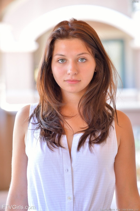 Innocent looking young flashes hanging labia lips before undressed sidewalk stroll