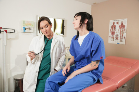 Nikki Hearts has lesbian sex with her doctor Sinn Sage at a clinic