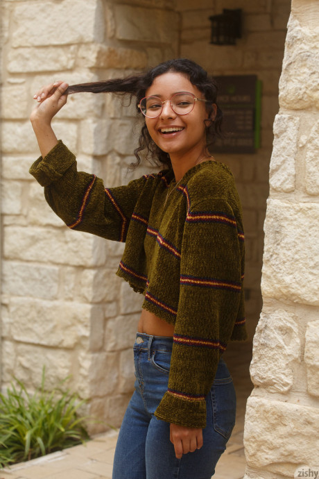 Pretty teen in glasses Renee Macias shows her sweet bum and small tits