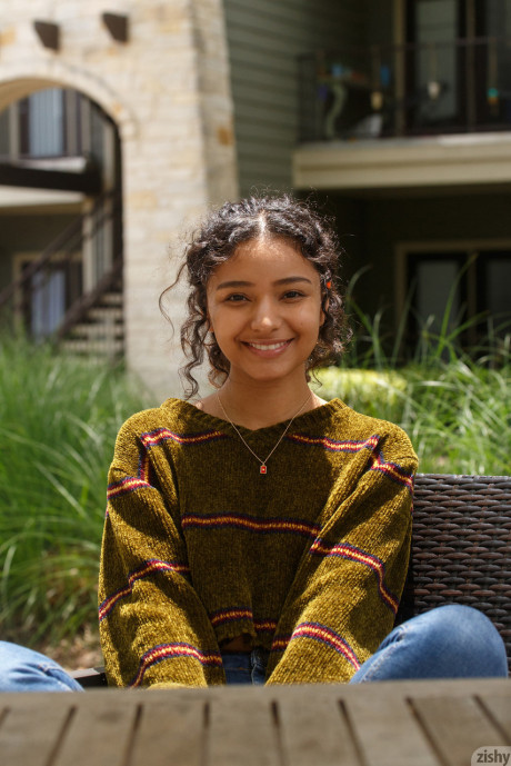 Pretty teen in glasses Renee Macias shows her sweet bum and small tits