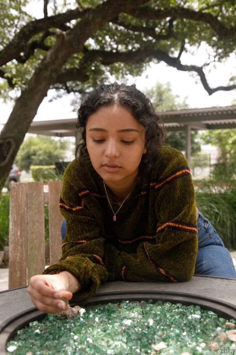 Pretty teen in glasses Renee Macias shows her sweet bum and small tits