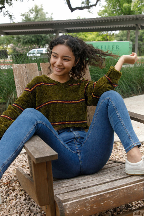 Pretty teen in glasses Renee Macias shows her sweet bum and small tits