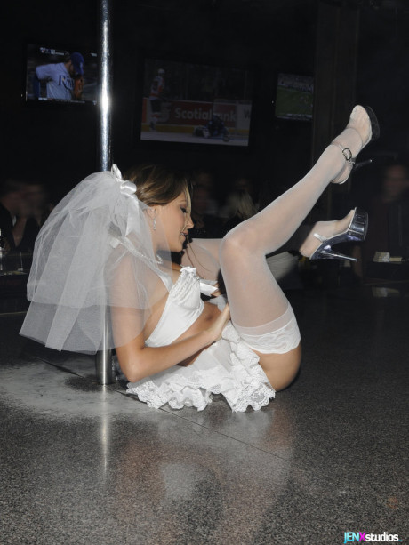 Jenna Haze puts on a show in a strip club while wearing white nylons