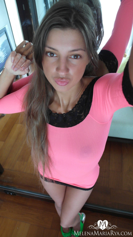 Russian cutie Malena Tara takes selfies as she strips and poses