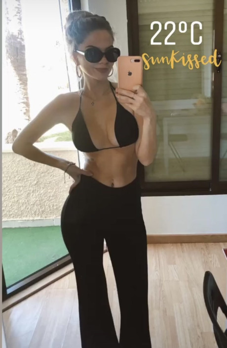 Attractive OnlyFans cam model shows off her ravishing thin body in bikinis