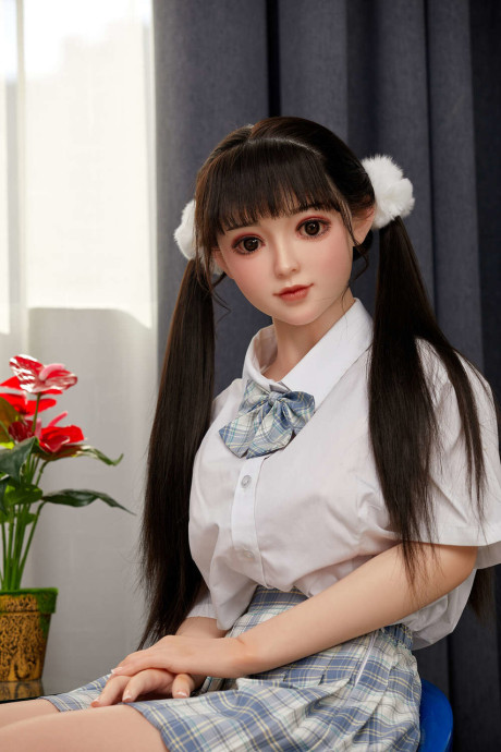 Lovely asian sex doll with pigtails Linda Lizzie posing in her schoolgirl outfit