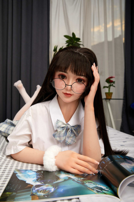 Lovely asian sex doll with pigtails Linda Lizzie posing in her schoolgirl outfit