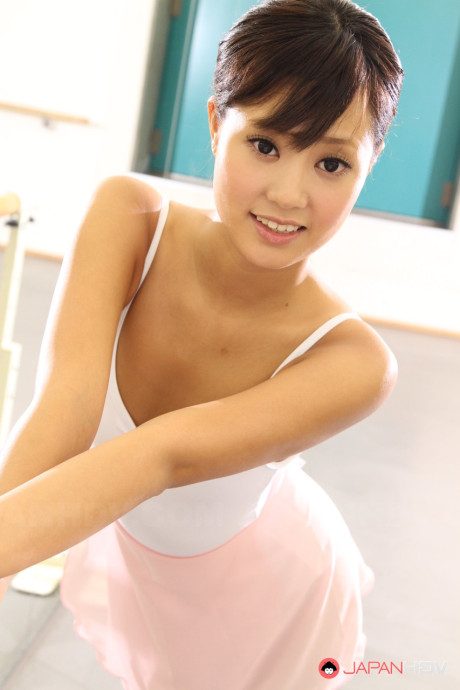 Japanese ballerina Ruri Kinoshita stretches her young young body in tights & tutu