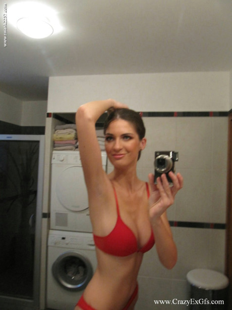 Busty brunette Kykola snaps her gigantic melons & her wide curtains up close