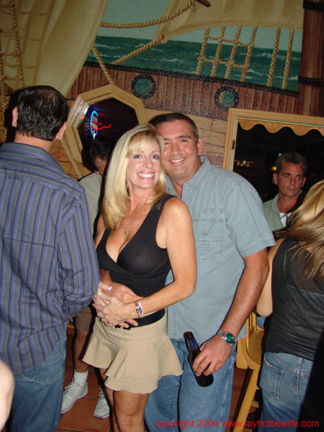 Wild old wifey Tracy lick shows off her gigantic boobies at a swingers party