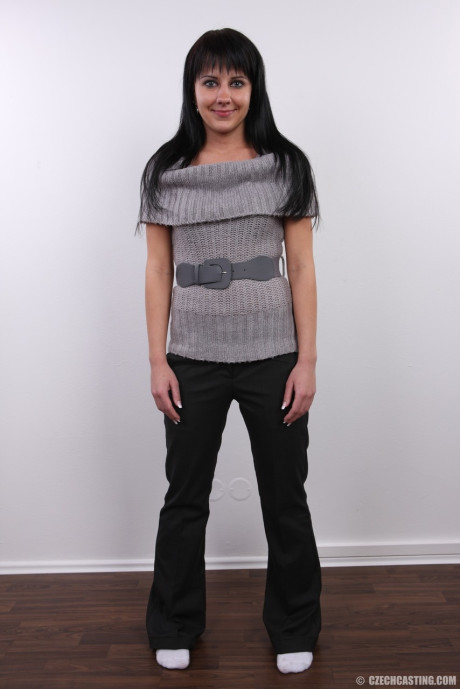 Dark haired girl gf girl Lucie stands fully clothed and then completely undressed as well