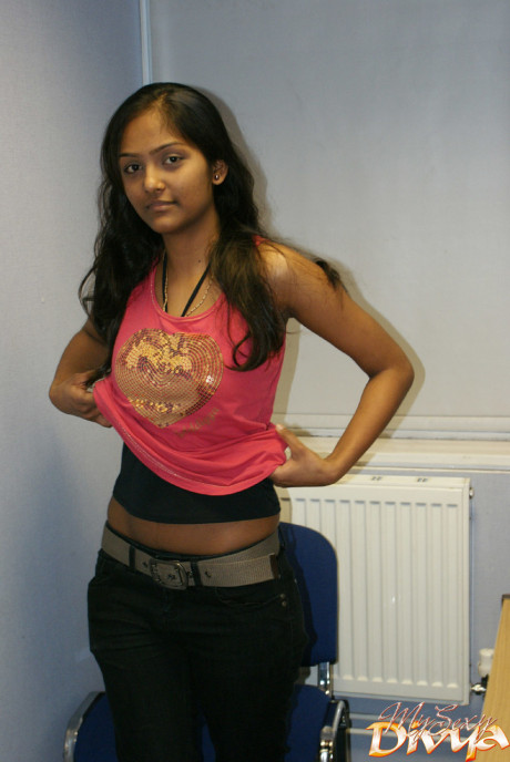 Desi solo slut girlfriend woman holds her nice titties as she undresses to model in the nude