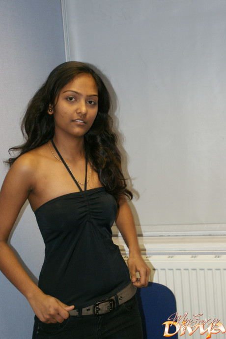 Desi solo slut girlfriend woman holds her nice titties as she undresses to model in the nude
