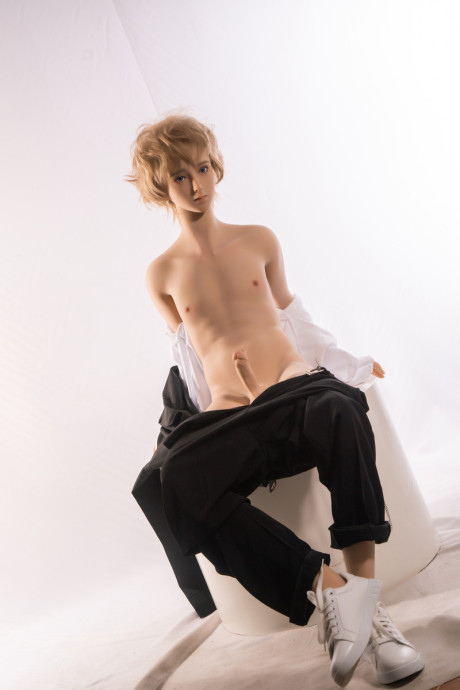 Little yellow-haired male sex doll Ming strips off his suit & displays his stiff schlong