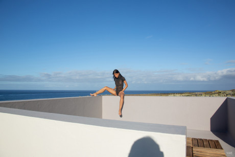 Small titted latina Karin Torres exposes her charming body & poses on the balcony