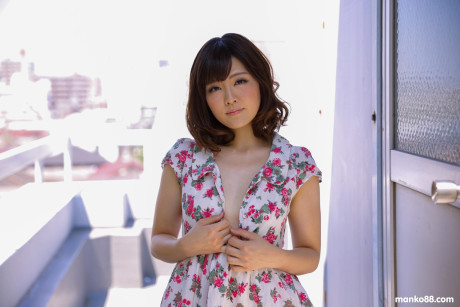 Gorgeous asian babe Tomoka Sakurai shows her tiny boobies & her trimmed pussy