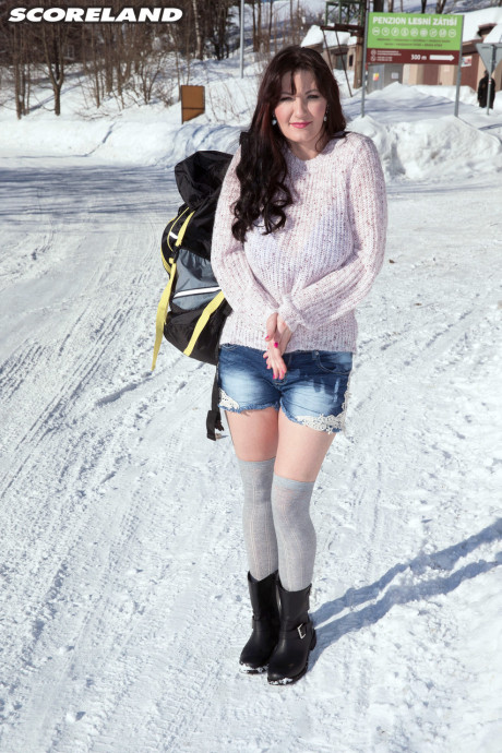Brunette hitchhiker Vanessa Y exposes her hooters and bush for a ride