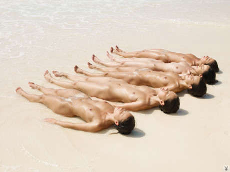 A gaggle of super pretty centerfolds posing nude & tribbing hotly at the beach