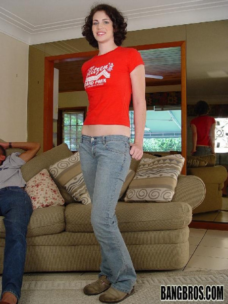 Pretty teenie with blue eyes shows her tiny boobs and blows a wide boner