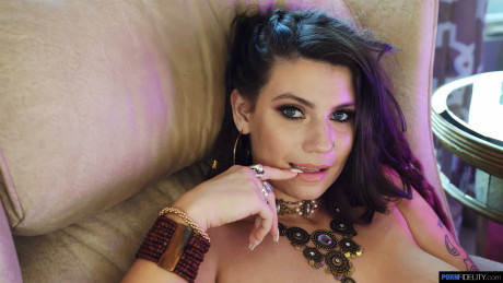 Brunette pornstar Indica Flower reveals her hot ass and fucks a dick