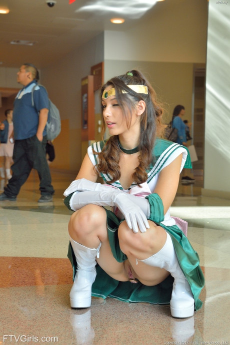 Brunette beauty Melody flashes her shaved snatch & toys her anus in public