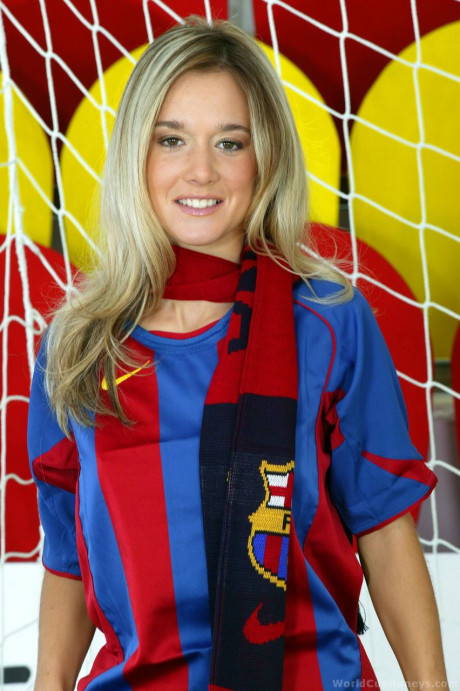 Cute blondie shows her boobies and cunt while keeping goal for soccer club