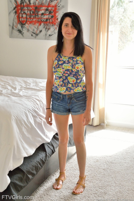 Teen with amazing naturals Lexi exposes her cunt and poses with a buttplug
