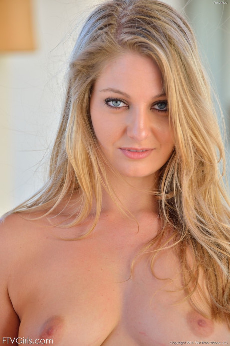 Delicious yellow-haired Veronica poses pantyless and strips down undressed in public