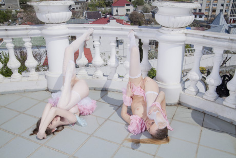 Cute slender teens Emily Bloom & Katie A show their tits & butts on a terrace