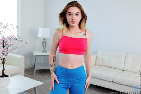 Acrobatic young babe Ruby Redbottom strips and poses after her yoga class