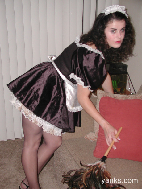 Ebony haired maid Michelle lifts her skirt up and drills her vagina with a toy