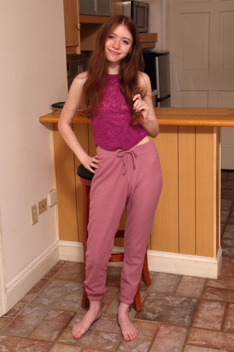 Amateur young Myra Glasford shows her slim figure and plays with her twat