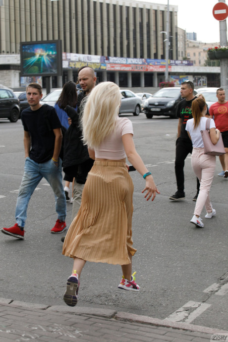 Amateur sweety Nika Nikitina flashes her panties and breasts in public