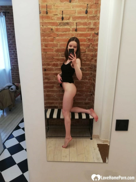 Skinny amateur teenie posing naked and in her cute dress in the mirror