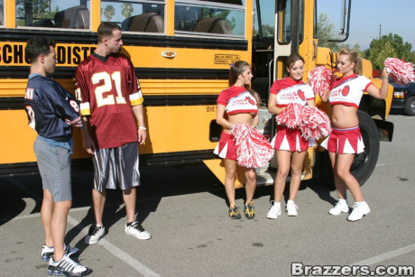 Three slutty cheerleaders starting a fervent debauchery in the school bus