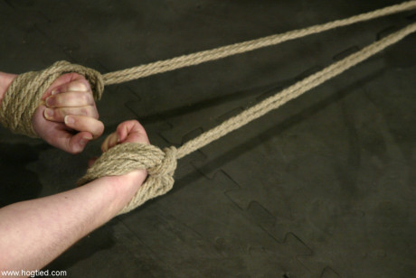 Undressed babe Stardust gets flogged and punished with a vibrator in rope bondage