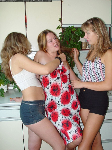 Horny teens with awesome butts strip and kiss each other's clam in the cuisine