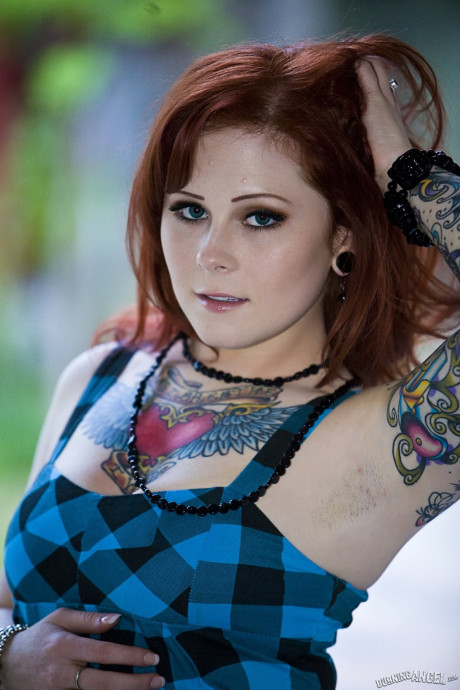 Ginger Head babe Misti Dawn gets naked on all fours flashing her butt and snatch