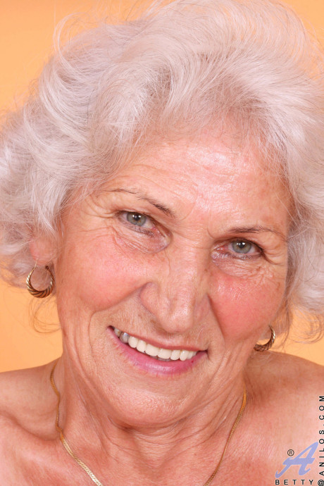 Grey haired old lady Betty exposes her saggy juggs and fingers her clam