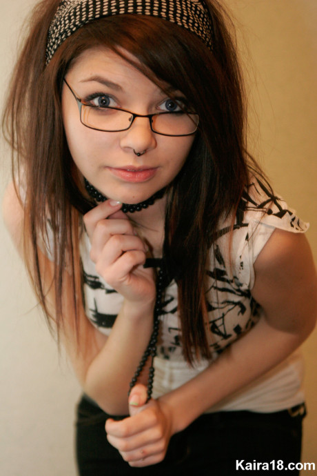 Barely legal young Kaira 18 takes her glasses off while modeling non undressed