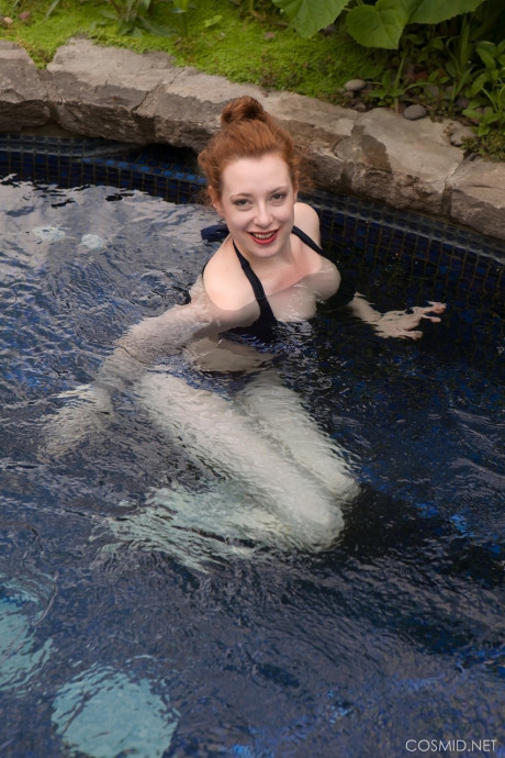 Pale ginger head Misha Lowe shows her monstrous naturals and bare butt in hot tub