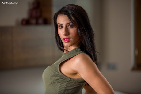 Slutty brunette Nelly Kent sheds short dress to expose her small boobies
