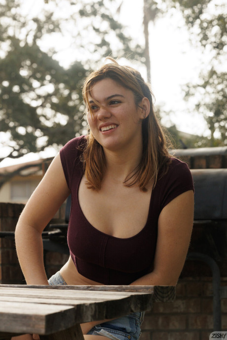 Adorable babe Ellie Nova shows her stunning titties and huge ass too