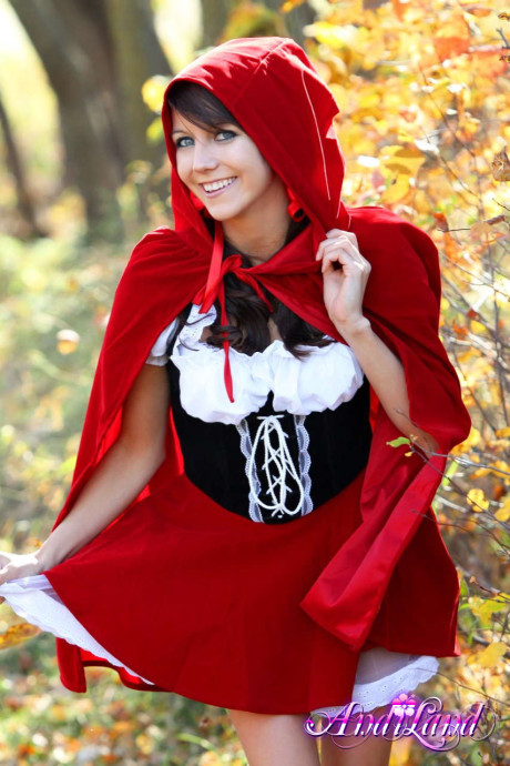 Cute teen Andi Land frees her boobies and cunt from a Red Riding Hood outfit